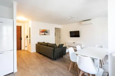 Télévision ou salle de divertissement dans l'établissement Appart 3 chambres - Les Lys