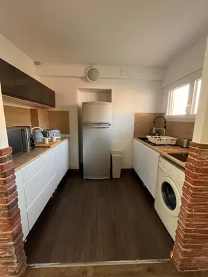 Cuisine ou kitchenette dans l'établissement À deux pas de la mer