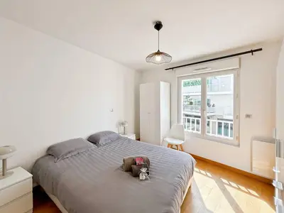 Un ou plusieurs lits dans un hébergement de l'établissement CAM103 - Beau 2 pièces avec terrasse