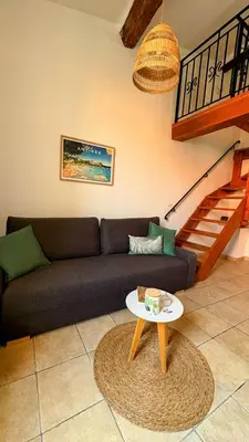 Coin salon dans l'établissement Boho Nest - Charming Boutique Apartment