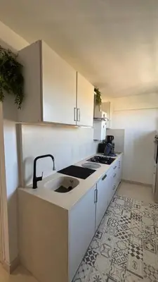 Cuisine ou kitchenette dans l'établissement La Cachette du Sud
