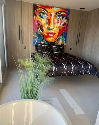 Un ou plusieurs lits dans un hébergement de l'établissement Appartement toit terrasse