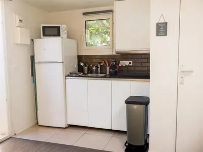 Cuisine ou kitchenette dans l'établissement Les Hirondelles