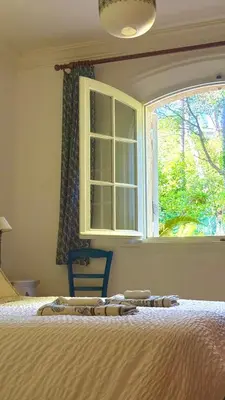 Un ou plusieurs lits dans un hébergement de l'établissement La Mauricette - Provençal House Mougins with Pool