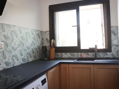 Cuisine ou kitchenette dans l'établissement Apartment les Gemeaux by Interhome