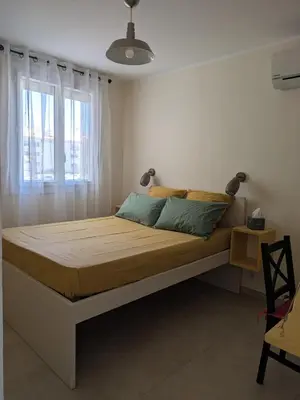Un ou plusieurs lits dans un hébergement de l'établissement Charming 2-room apartment in Cannes