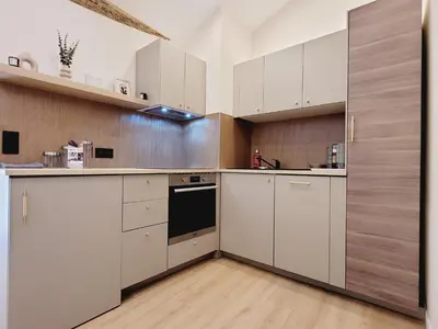 Cuisine ou kitchenette dans l'établissement Le Nid de Revennes - séjour cosy dans la vieille ville d'Antibes