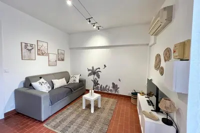 Coin salon dans l'établissement Studio with pool - near beach