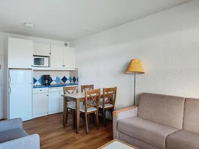 Cuisine ou kitchenette dans l'établissement Residences partenaire le tanit