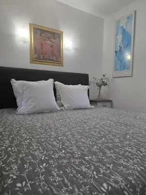 Un ou plusieurs lits dans un hébergement de l'établissement 1-Bedroom guesthouse with pool access
