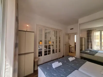 Un ou plusieurs lits dans un hébergement de l'établissement Ferrié Plage Palais Cannes