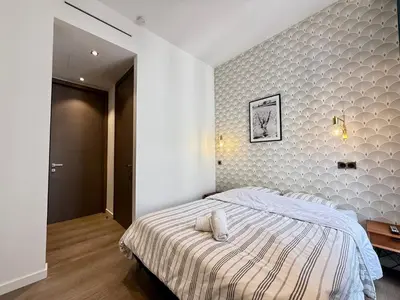 Un ou plusieurs lits dans un hébergement de l'établissement Carré d'Or - Luxueux - Vue mer