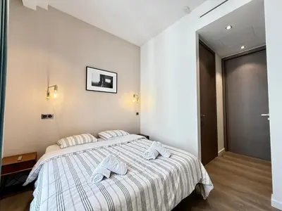 Un ou plusieurs lits dans un hébergement de l'établissement Carré d'Or - Luxueux - Vue mer