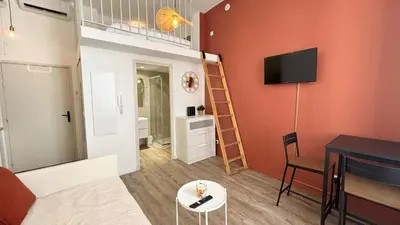 Télévision ou salle de divertissement dans l'établissement Proche Palais Des Festivals, T2 avec Mezzanine - Palmazur Vacances