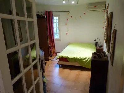 Un ou plusieurs lits dans un hébergement de l'établissement appartement Rez de Jardin,Bas de villa