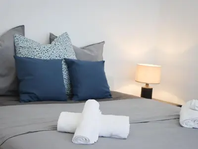 Un ou plusieurs lits dans un hébergement de l'établissement Apartment Le Lerins by Interhome