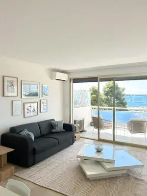 Coin salon dans l'établissement Vue mer - Pointe Croisette - 1 chambre Spacieuse