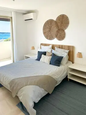 Un ou plusieurs lits dans un hébergement de l'établissement Vue mer - Pointe Croisette - 1 chambre Spacieuse