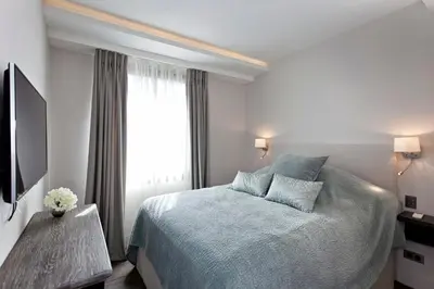 Un ou plusieurs lits dans un hébergement de l'établissement REF 1238 - Cannes Croisette - Sea view apartment for rent