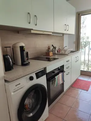 Cuisine ou kitchenette dans l'établissement Les Clés d'Or d'Antibes