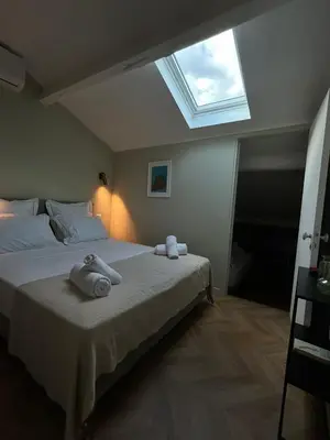 Un ou plusieurs lits dans un hébergement de l'établissement Appartement 3 pièces plein vieil antibes
