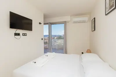 Un ou plusieurs lits dans un hébergement de l'établissement SWEETY- IDEAL COUPLE Moderne 2P, vue mer, parking, clim