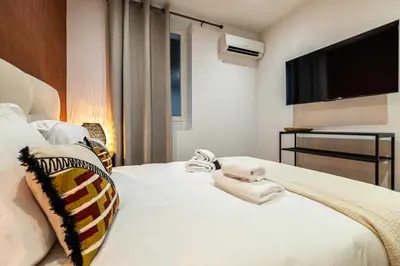 Un ou plusieurs lits dans un hébergement de l'établissement Magnificent apartment - AC- 2BR- 4P - Cannes