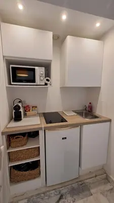 Cuisine ou kitchenette dans l'établissement Beau studio centre Cannes Maréchal Juin