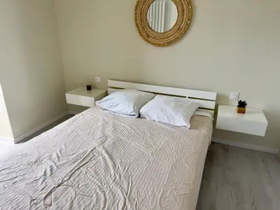 Un ou plusieurs lits dans un hébergement de l'établissement Sea view 4 people terrace 60 m & pool