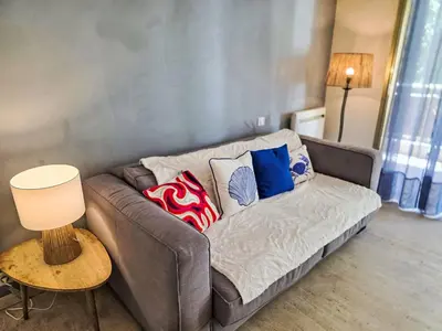 Coin salon dans l'établissement Apartment Villa Lerins-8 by Interhome