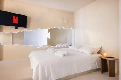 Un ou plusieurs lits dans un hébergement de l'établissement Caldera # Love Suite - Proche Croisette et Centre - Baignoire Duo