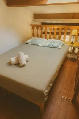 Un ou plusieurs lits dans un hébergement de l'établissement Le Cœur d Antibes Studio charme et confort