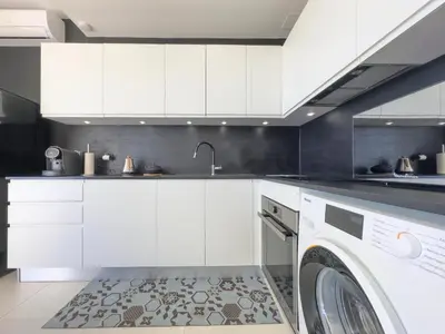 Cuisine ou kitchenette dans l'établissement Le KamS