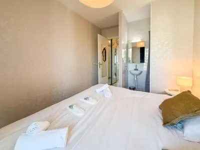 Un ou plusieurs lits dans un hébergement de l'établissement Sea View Apartment - Croisette