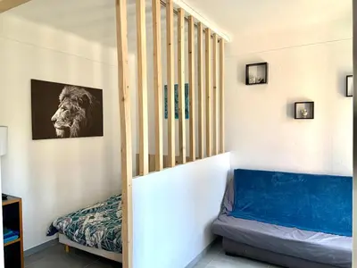Coin salon dans l'établissement Appartement Le Central Park