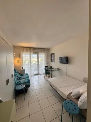 Télévision ou salle de divertissement dans l'établissement Studio front de mer - Accès direct plage - Parking