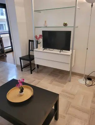 Télévision ou salle de divertissement dans l'établissement Studio antibes mer