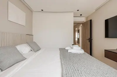 Un ou plusieurs lits dans un hébergement de l'établissement LX169 Design lumineux a deux pas de la Croisette