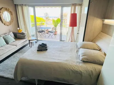 Un ou plusieurs lits dans un hébergement de l'établissement Grande studio, Vue mer magnifique