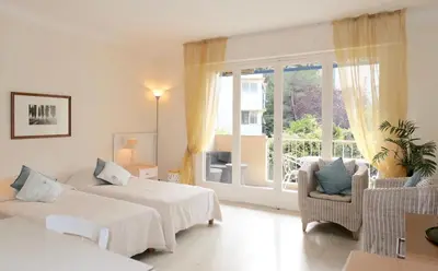 Un ou plusieurs lits dans un hébergement de l'établissement Spacious Studio Apartment Near The Beach - 2313