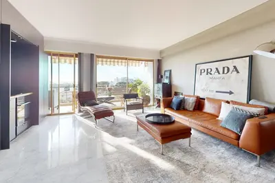 Coin salon dans l'établissement Apartment T2 Golfe Juan PANORAMIC SEA VIEW