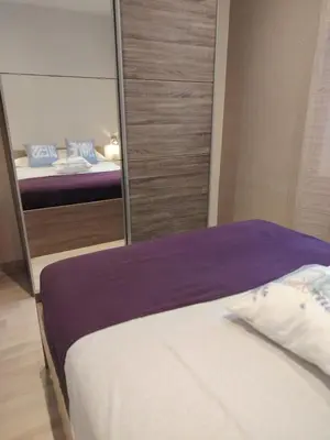 Un ou plusieurs lits dans un hébergement de l'établissement Cannes centre T3 Carré D'Or calme air conditionné WiFi