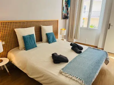 Un ou plusieurs lits dans un hébergement de l'établissement Appartement centre-ville à 5 min du palais des festivals