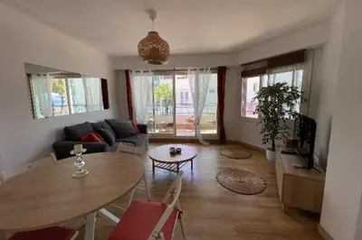 Coin salon dans l'établissement Facing the sea 2 steps from the beaches