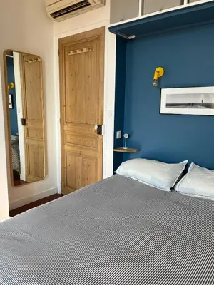 Un ou plusieurs lits dans un hébergement de l'établissement Elégant appartement 2 pièces centre Cannes Croisette plages