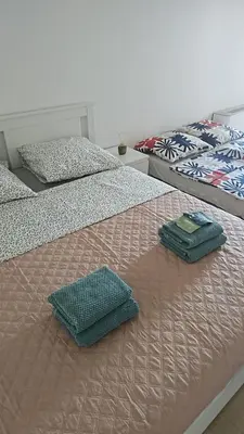 Un ou plusieurs lits dans un hébergement de l'établissement Quiet Seaside Apartment, 1 Min to Beach, Parking, Promenade de la Plage