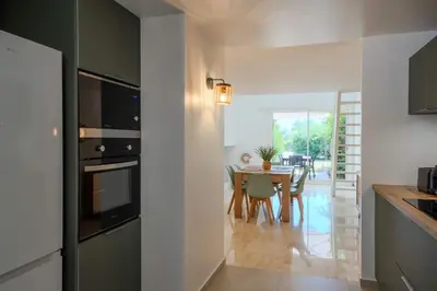Cuisine ou kitchenette dans l'établissement Charmante Maison dans une belle residence
