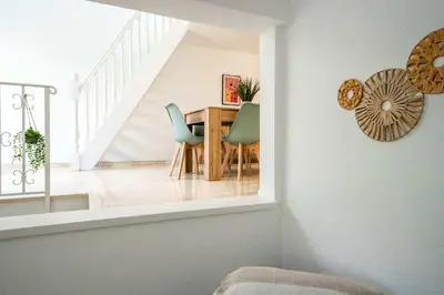 Coin salon dans l'établissement Charmante Maison dans une belle residence
