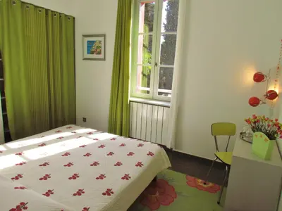 Un ou plusieurs lits dans un hébergement de l'établissement Villa Chandra