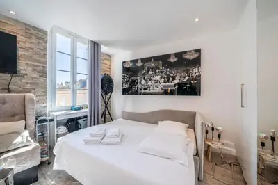 Un ou plusieurs lits dans un hébergement de l'établissement Beautiful studio rue d'Antibes